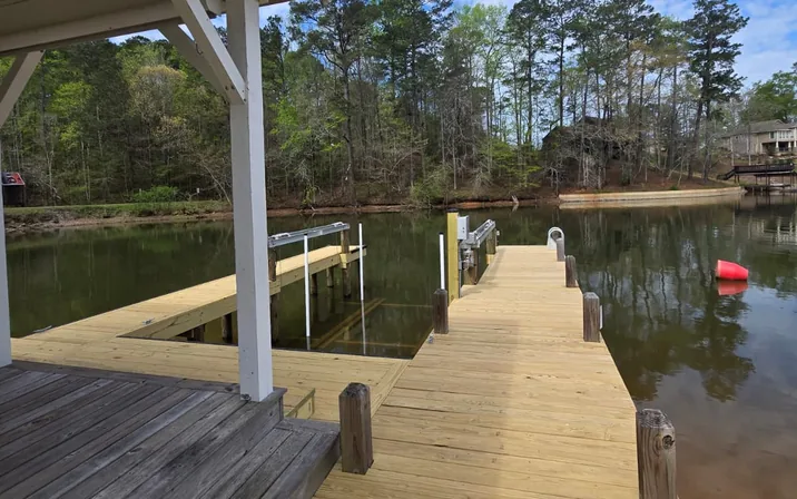Lake dock decking before its staining by SQ Painting